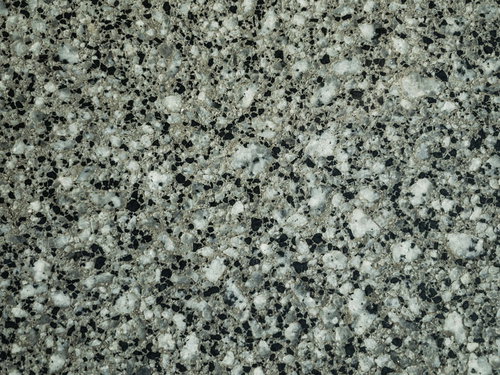 公園にある水飲み場の花崗岩石材テクスチャー