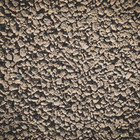 水捌けが良い粗い質感のアスファルト舗装材の写真