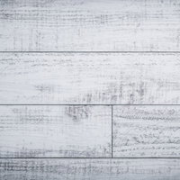 白く塗られた木製板のテクスチャ。経年変化による剥がれと汚れの写真