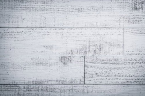 白く塗られた木製板のテクスチャ。経年変化による剥がれと汚れ