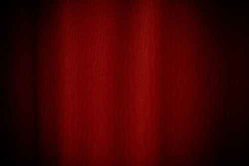 赤い波模様のテクスチャー、布地の質感を活かしたグラデーション背景