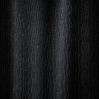 薄暗い波模様の布テクスチャーの写真