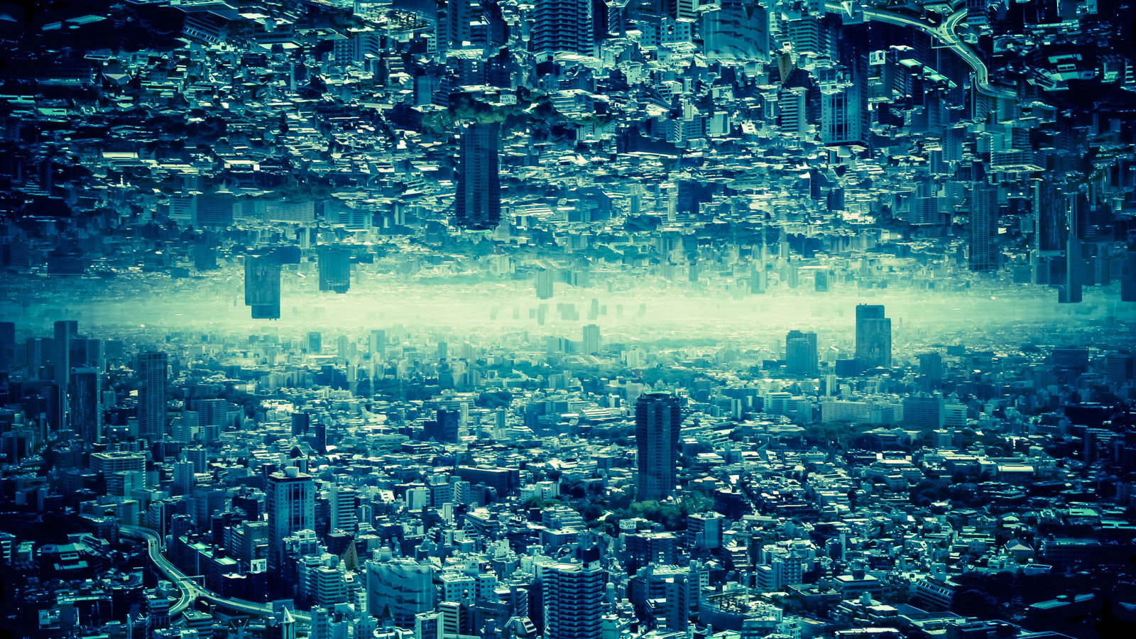 都市の建物が上下反転して中央に明るい帯がある合成都市写真