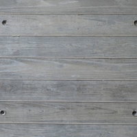 グレーの木の板が横に並ぶ板壁のテクスチャーの写真