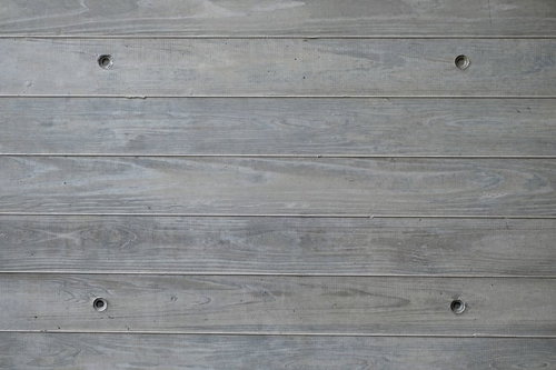 グレーの木の板が横に並ぶ板壁のテクスチャー