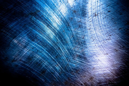 傷と歪みが入ったスチール表面のメタルテクスチャ