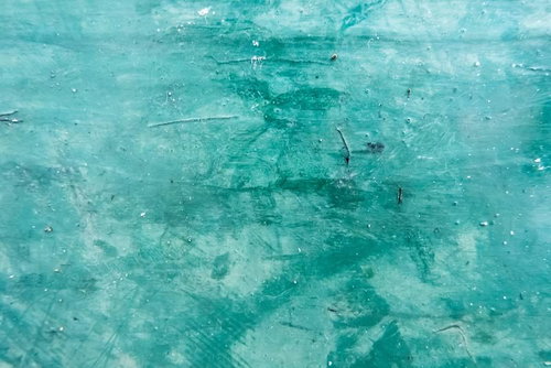 緑色に塗装した壁のテクスチャ、自然な色ムラと質感