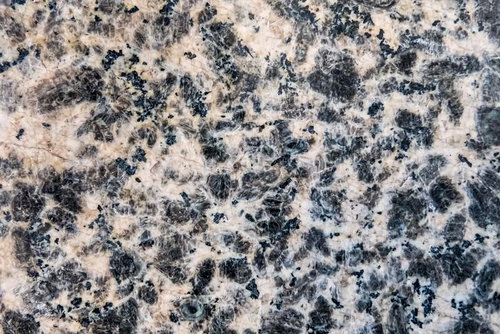 噛んだガムがこびりついているような白ベージュの壁テクスチャ