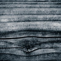 古い木板の木目と節のテクスチャーの写真