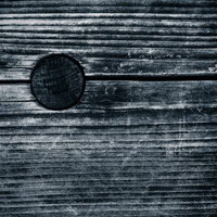 経年劣化した木造の壁テクスチャの写真