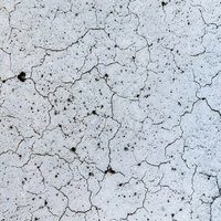 ひび割れが多い壁のテクスチャーの写真