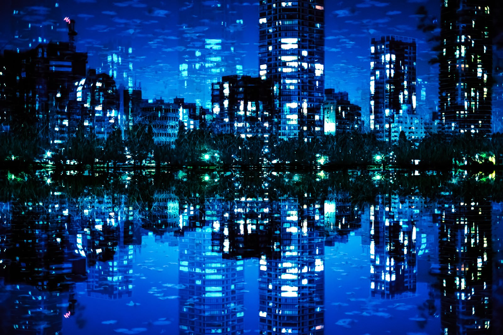 夜景のビル群と不忍池を組み合わせたフォトモンタージュ作品