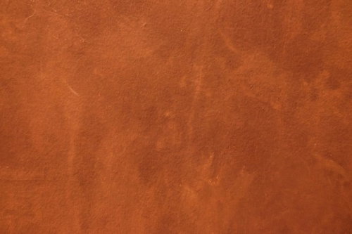 茶色くざらついた凹凸のあるテクスチャー表面