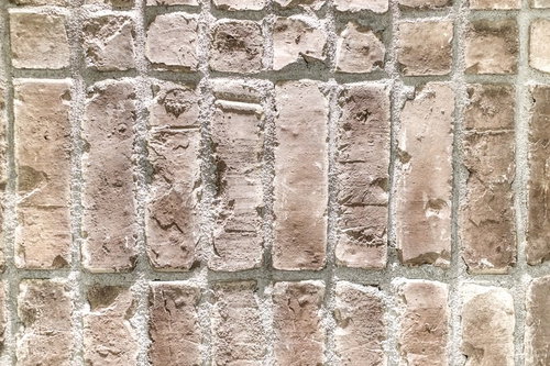 粗い質感の外壁タイル表面のエイジングテクスチャー