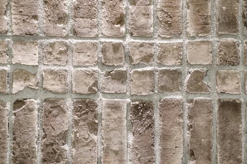 ラットスタイルのレンガ積み外壁・風化したセメント目地のテクスチャー