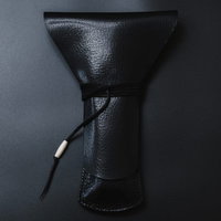 三味線の撥を収納する黒色の撥ケース 紐付きの写真