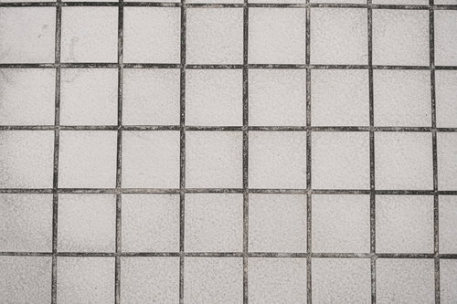 グレー色の石材タイルと目地のテクスチャ、正方形パターン