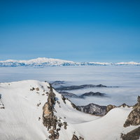 焼岳山頂から望む白山方面の雪景色と北アルプスの絶景の写真