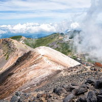 乗鞍剣ヶ峰への登山道から見える雲海と北アルプスの風景の写真