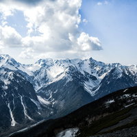 蝶ヶ岳から望む残雪の槍ヶ岳と北アルプスの冬山風景の写真