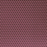 小豆色の粒々感を持つテクスチャー表面の写真