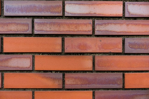 色あせたレンガタイルの壁テクスチャ