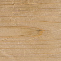 傷と凹みが目立つ木目のテクスチャーの写真