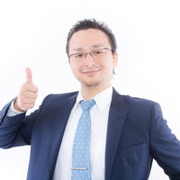 グッジョブ！！する外国人ハーフビジネスマンの写真