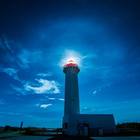 宮古島の星空と夜の入り江の写真