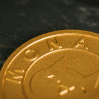 国産仮想通貨モナコインの金色コインの写真