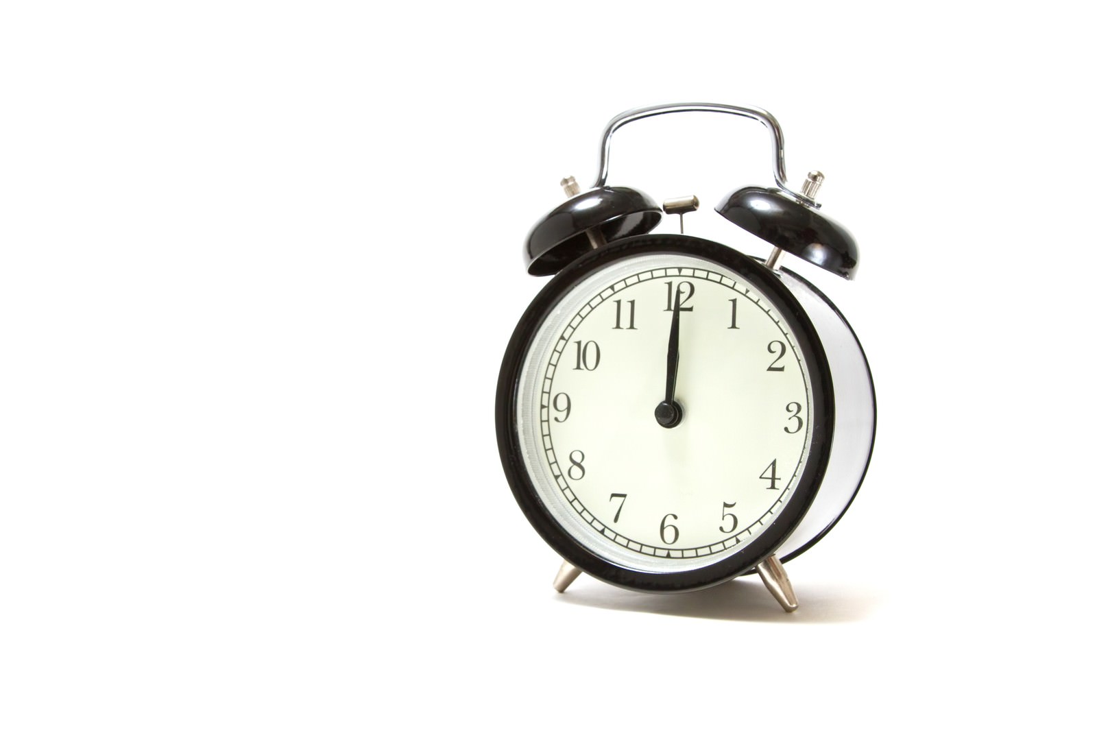 12時を指すお昼の目覚まし時計