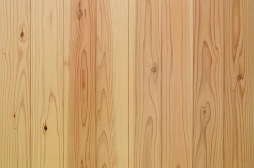 明るい茶色の木目の筋が並ぶ木材テクスチャ