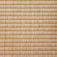 茶色と白の縞模様が並ぶ古い畳のテクスチャーの写真