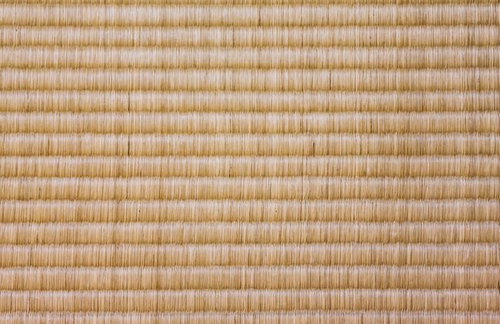 茶色と白の縞模様が並ぶ古い畳のテクスチャー