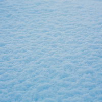 一面に広がる雪の表面テクスチャーの写真