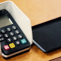 お会計とクレジットカードの暗証番号入力の写真