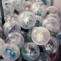 電子部品が入った透明なカプセルの集まりの写真