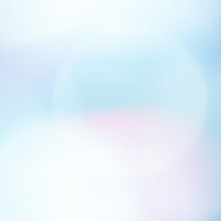 色が混ざり合ったぼけた光の差し込む抽象的な暖色の写真