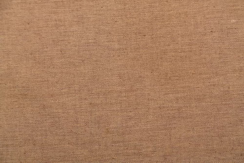 茶色い綿布の織り目テクスチャ