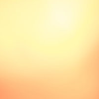 オレンジ色の光が柔らかく広がるグラデーションの写真
