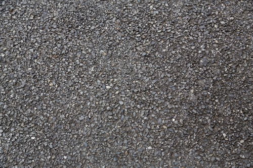 ざらざらとした質感のアスファルト道路の路面テクスチャ