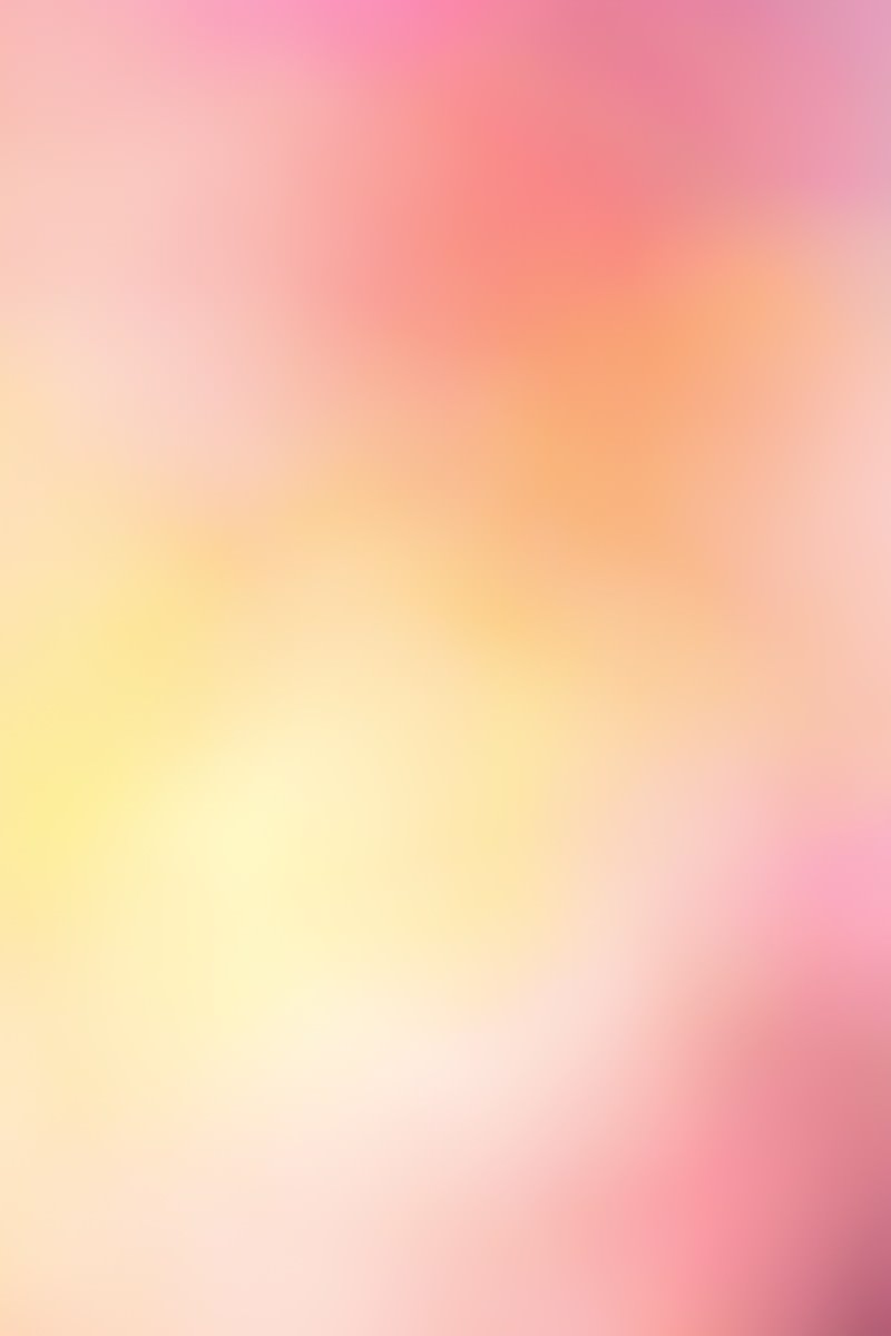 ピンクから黄色へ変化するグラデーションの温かい光の背景