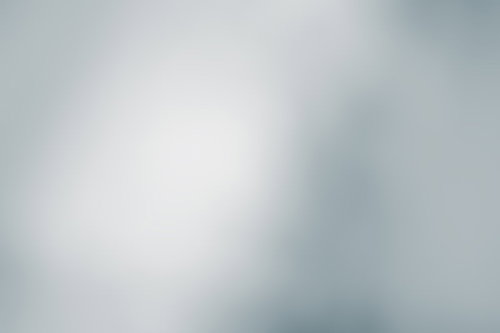 灰色のボケと光のテクスチャー背景