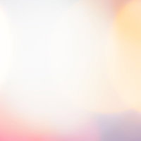 明るく照らす光のボケとグラデーション背景の写真