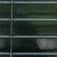 古い鉄のシャッターの錆と風化した表面テクスチャーの写真