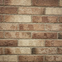 色ムラがある煉瓦の壁テクスチャーの写真