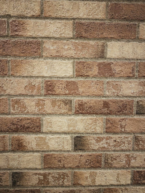 色ムラがある煉瓦の壁テクスチャー