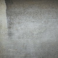 表面がザラザラする粗いコンクリート壁のテクスチャの写真