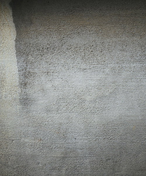 表面がザラザラする粗いコンクリート壁のテクスチャ