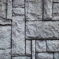 グレーの石積み調タイル壁テクスチャーの写真